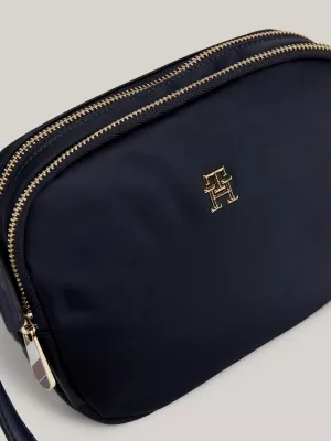 Bolsa transversal com emblema TH