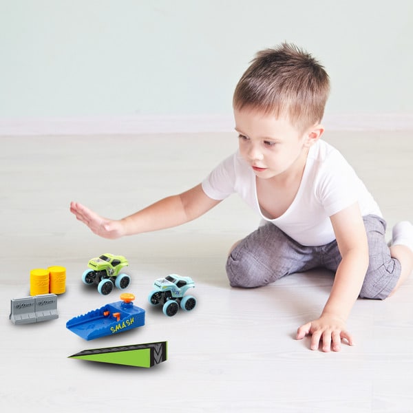 2 Voitures à friction + Booster et accessoires