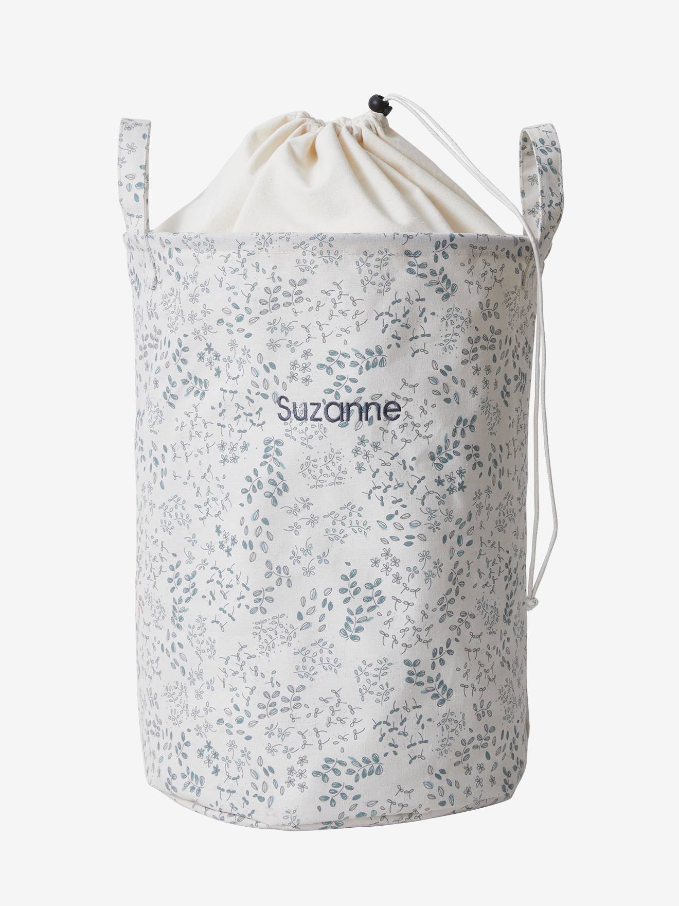Cesto de roupa suja com estampa floral branca
