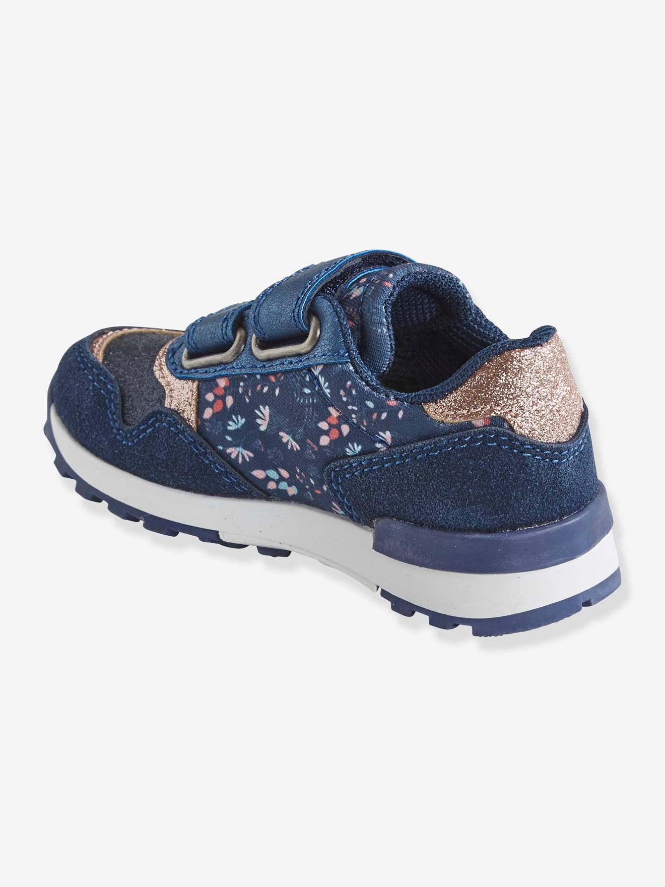 Tênis infantil estilo corrida com fecho de velcro, azul escuro liso com estampas.