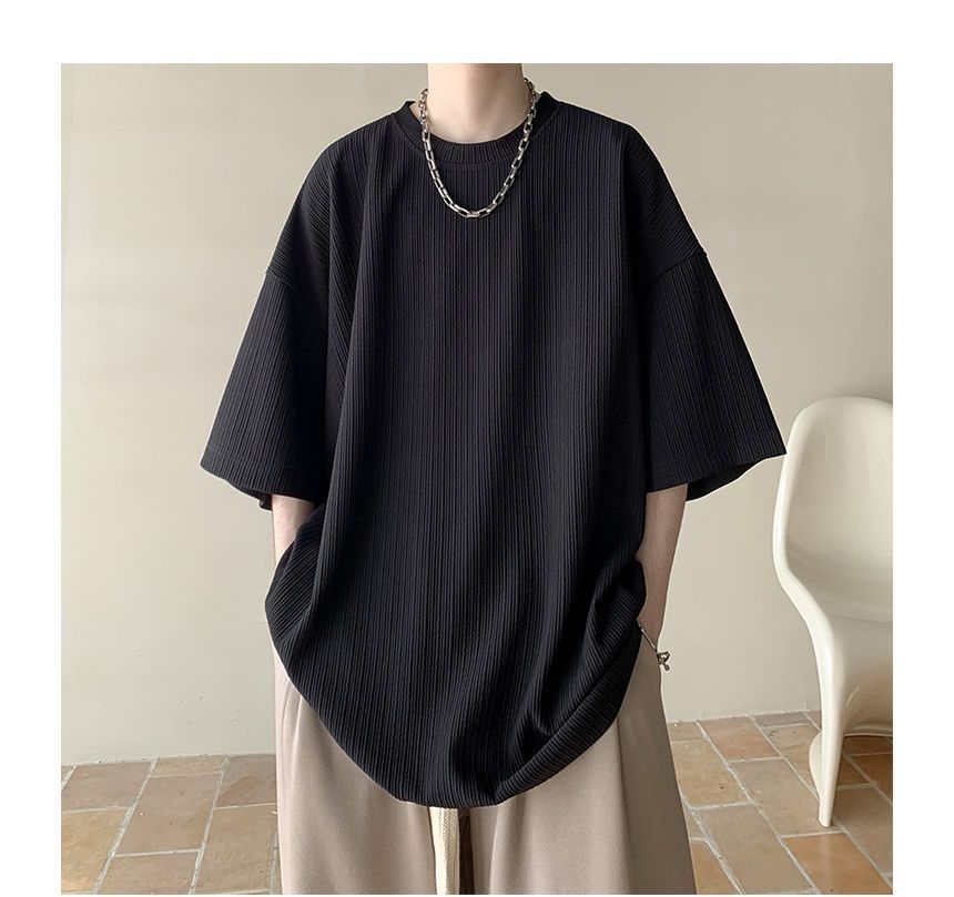 Nightbell - Effen oversized T-shirt met ronde hals en elleboogmouwen