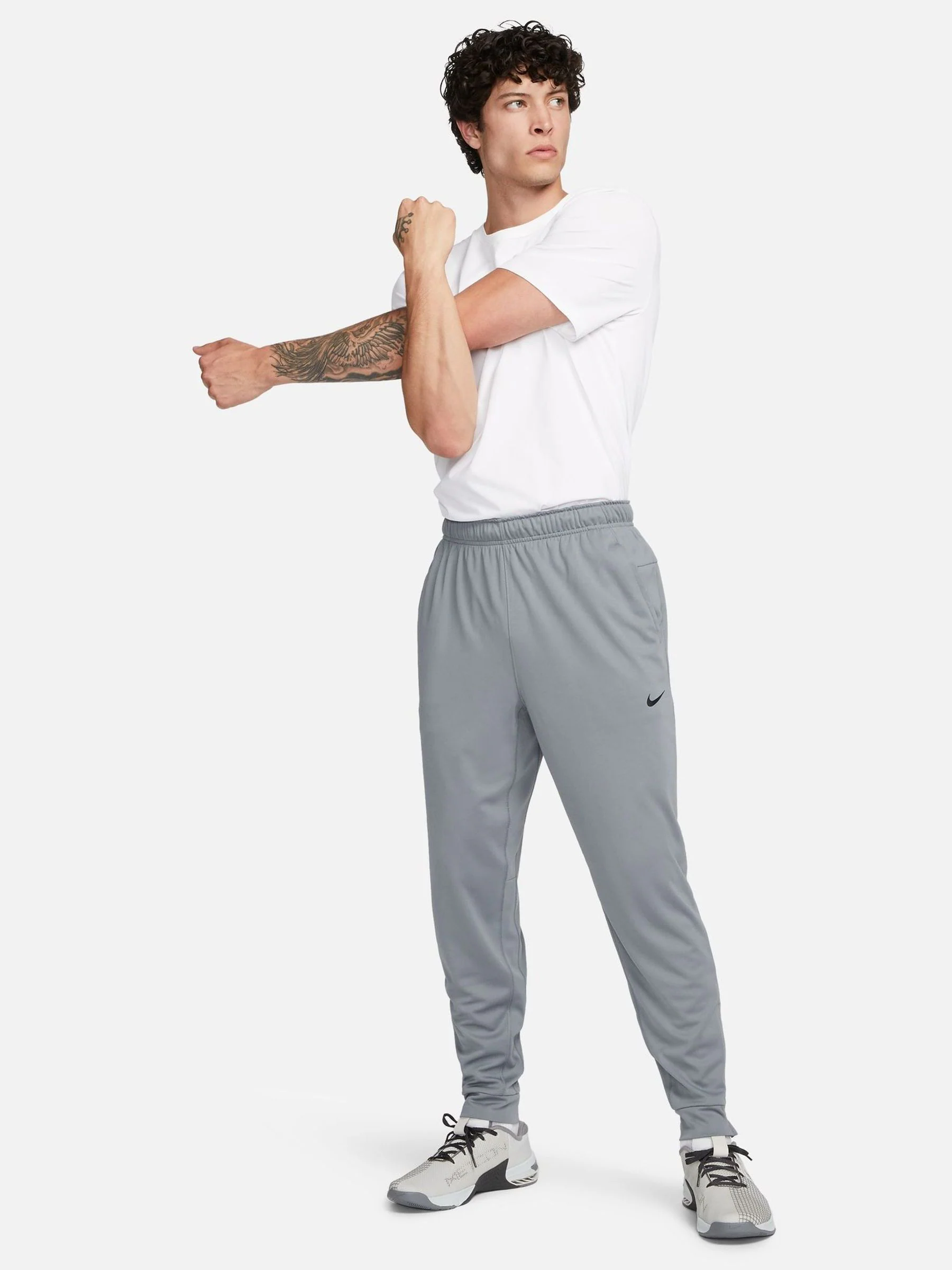 Rookgrijs - Nike Dri-FIT Totality trainingsbroek met taps toelopende pijpen