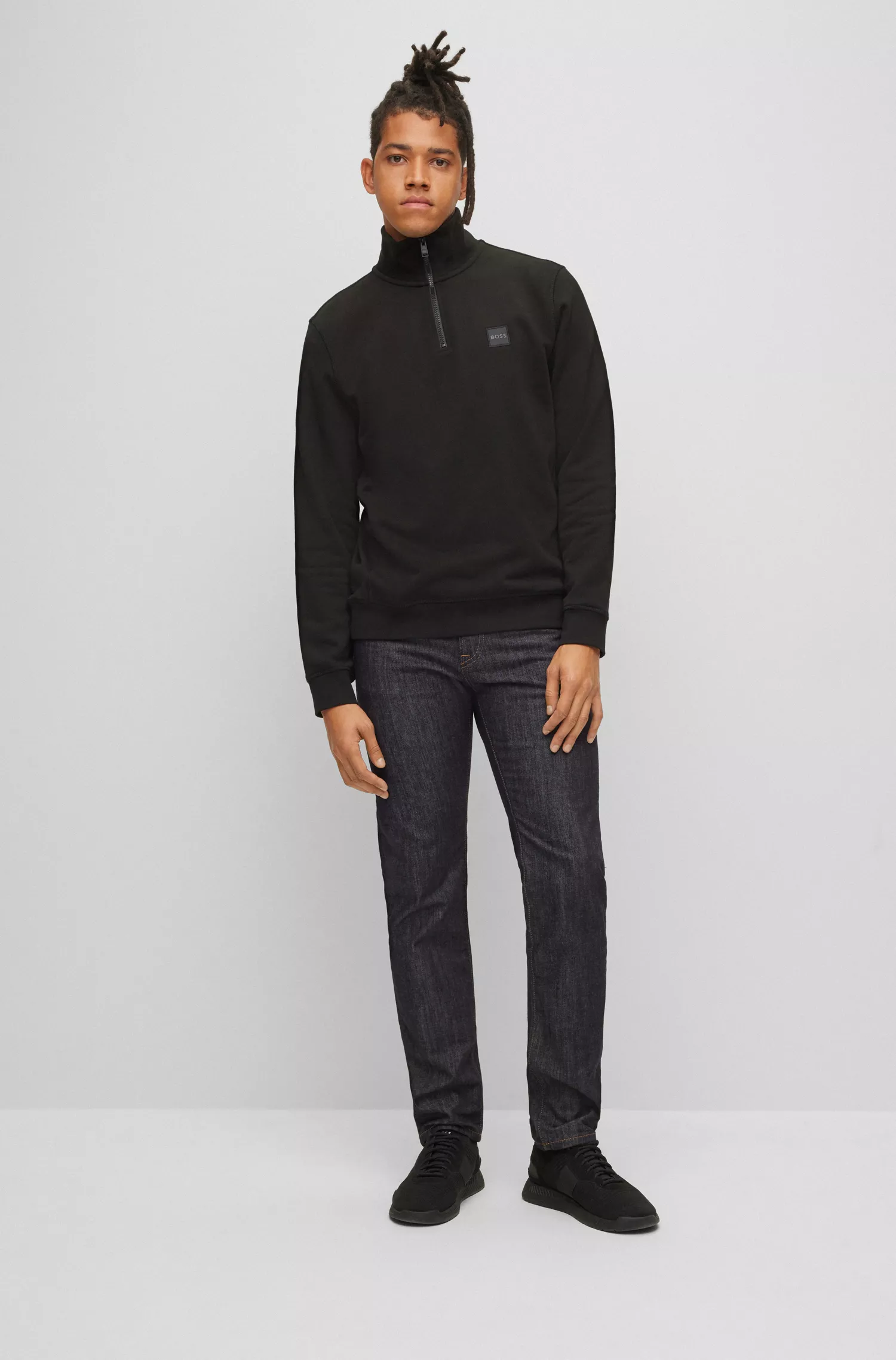 Calça jeans BOSS laranja, corte regular, em denim elástico azul.