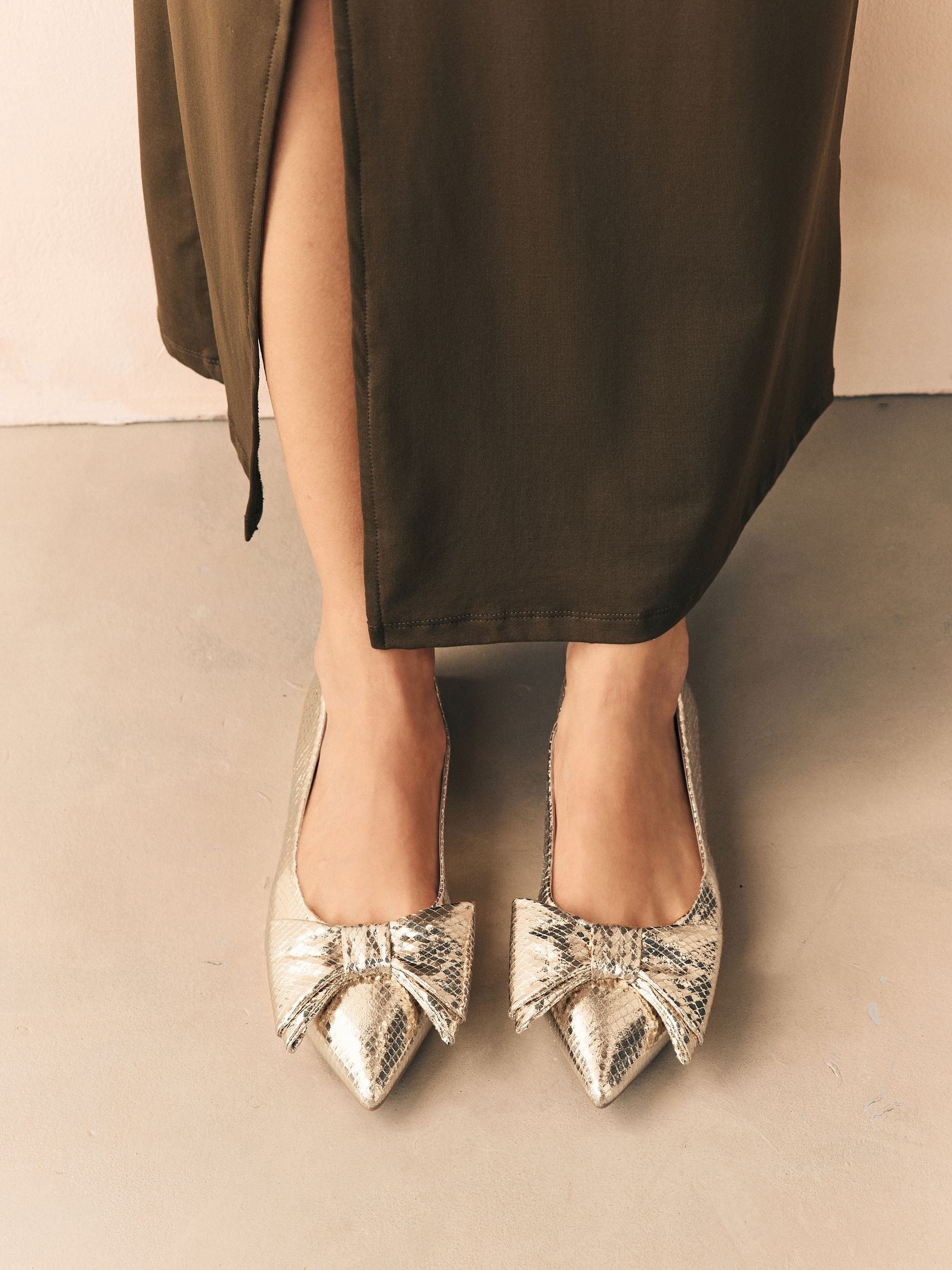 Goud - Ballerina's met spitse neus en strik