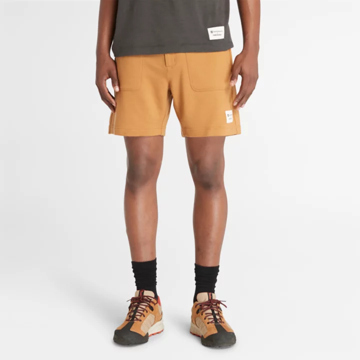 Shorts Timberland x Icebreaker Merino Terry Chino para homem, na cor amarela.
