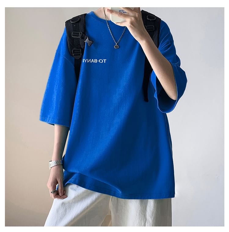 Bay Go Mall - T-shirt met ronde hals en elleboogmouwen en belettering