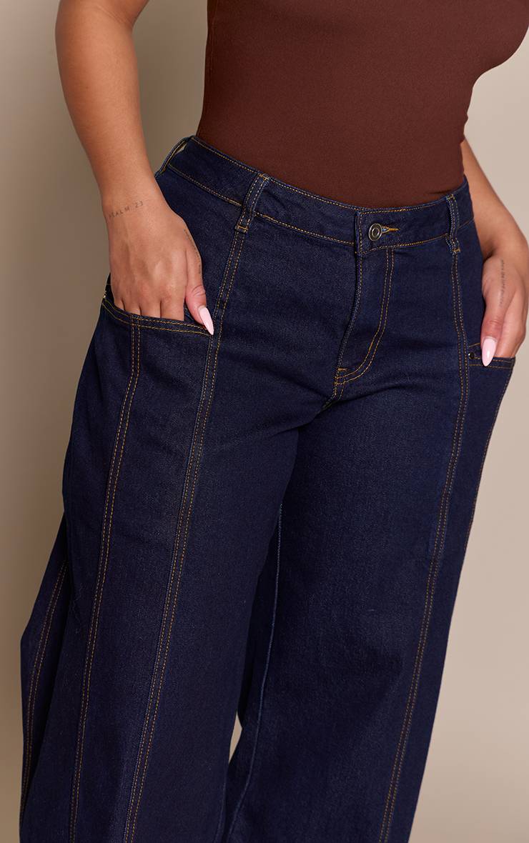 Bleu Jean Jambe Large À Détails De Coutures Sculptant