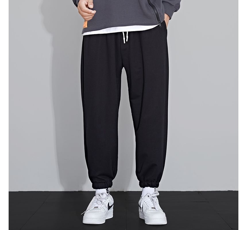 Acrius - Effen cropped harem-joggingbroek met trekkoord in de taille