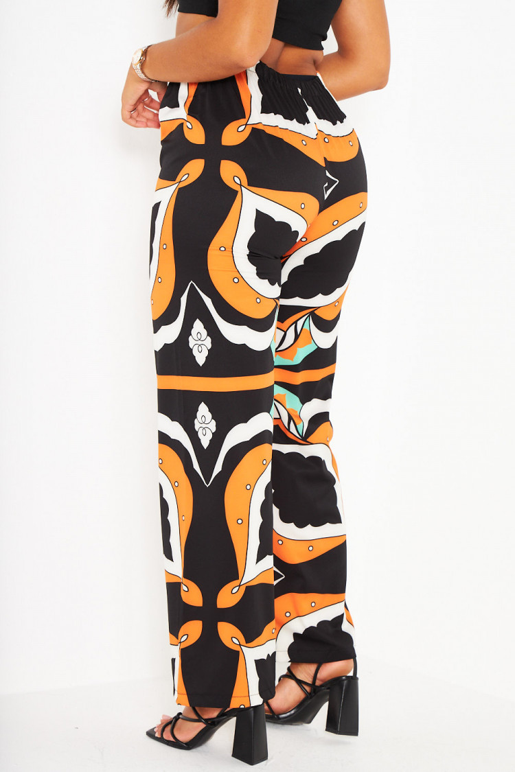 Pantalon orange large et baroque