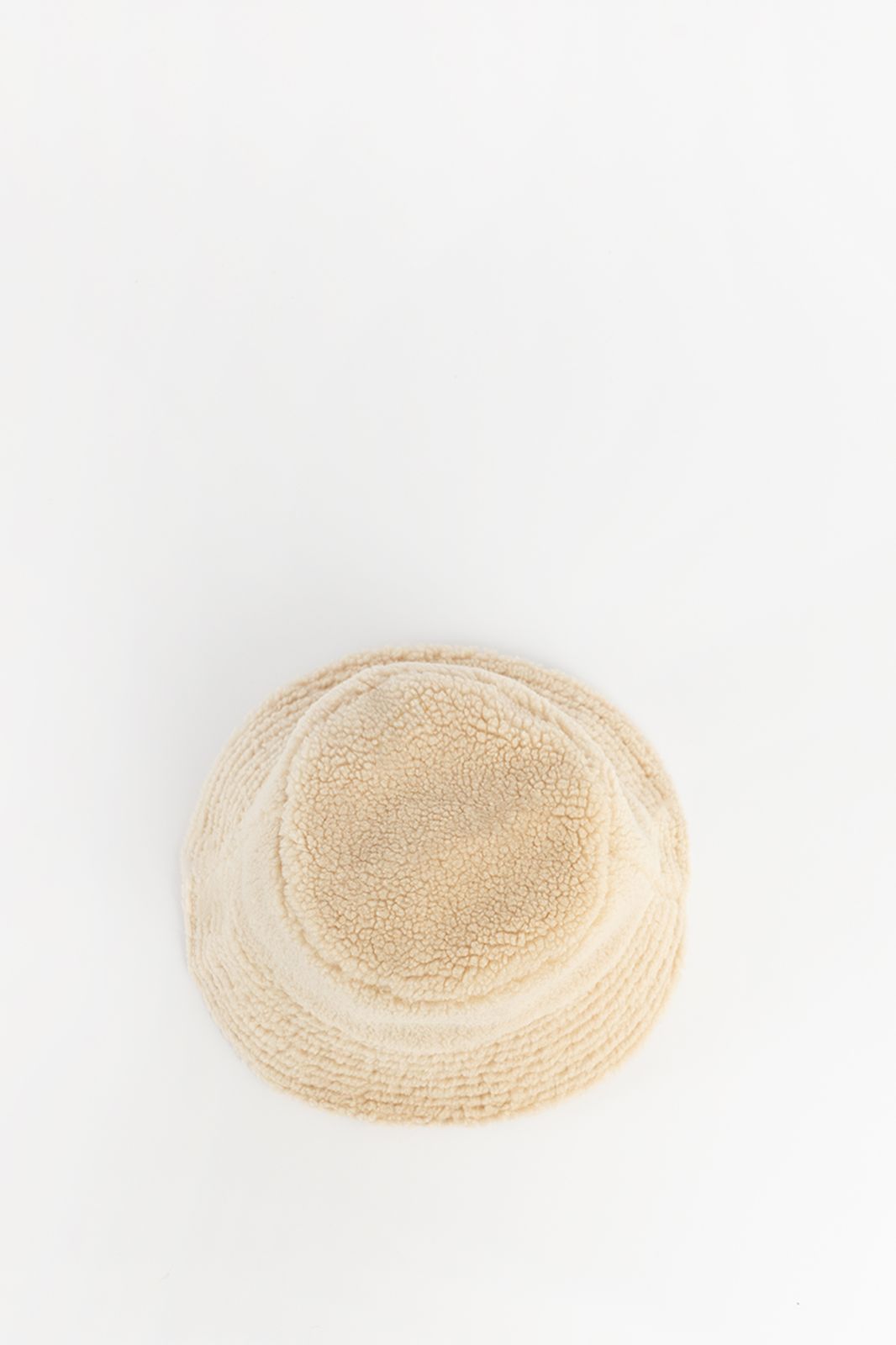 Beige reversible teddy en rib bucket hat
