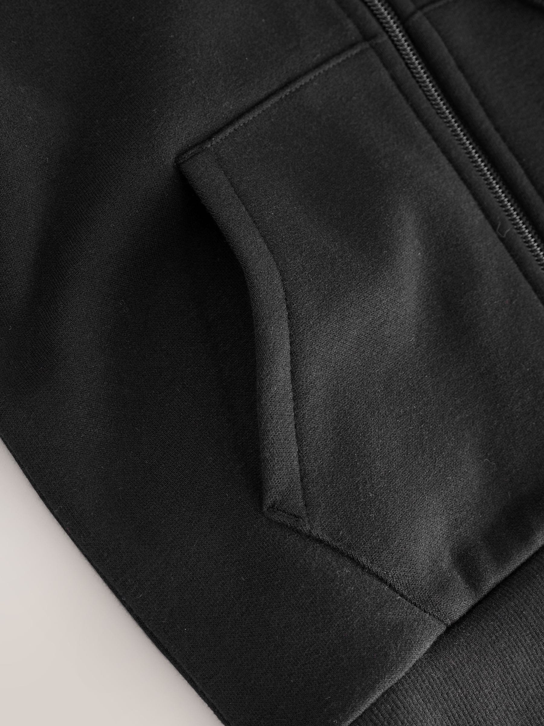 Zwart - Hoodie met logo en ritssluiting (3-16jr)
