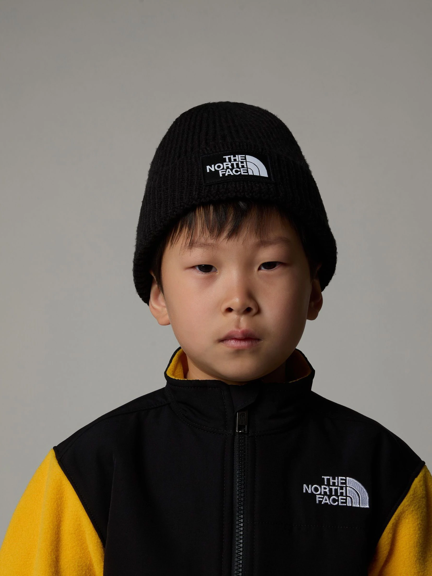 The North Face beanie met logo op de omslag voor kinderen