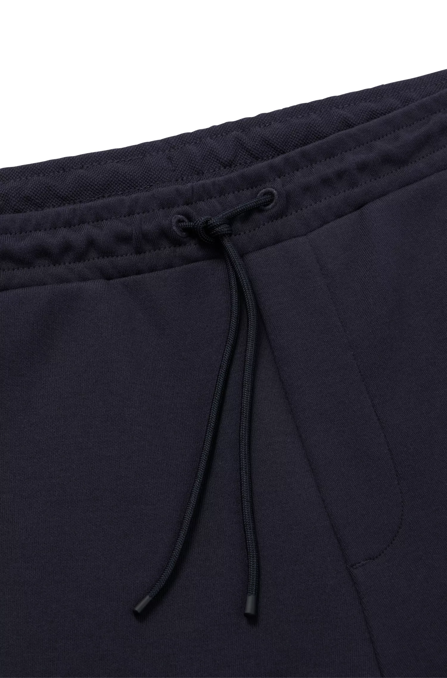 Calça de fato de treino BOSS em algodão verde com logótipo curvo