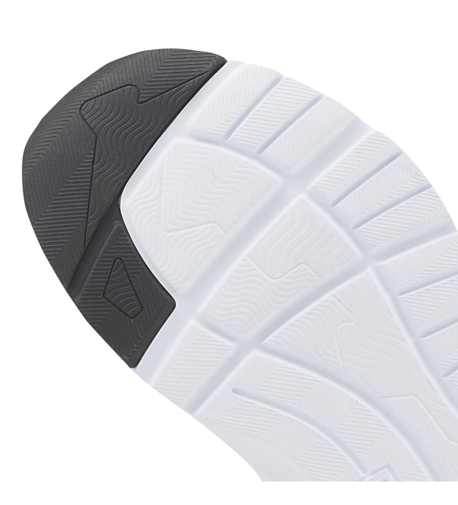 Tênis Puma Trinity AC+ PS de couro, branco e preto.