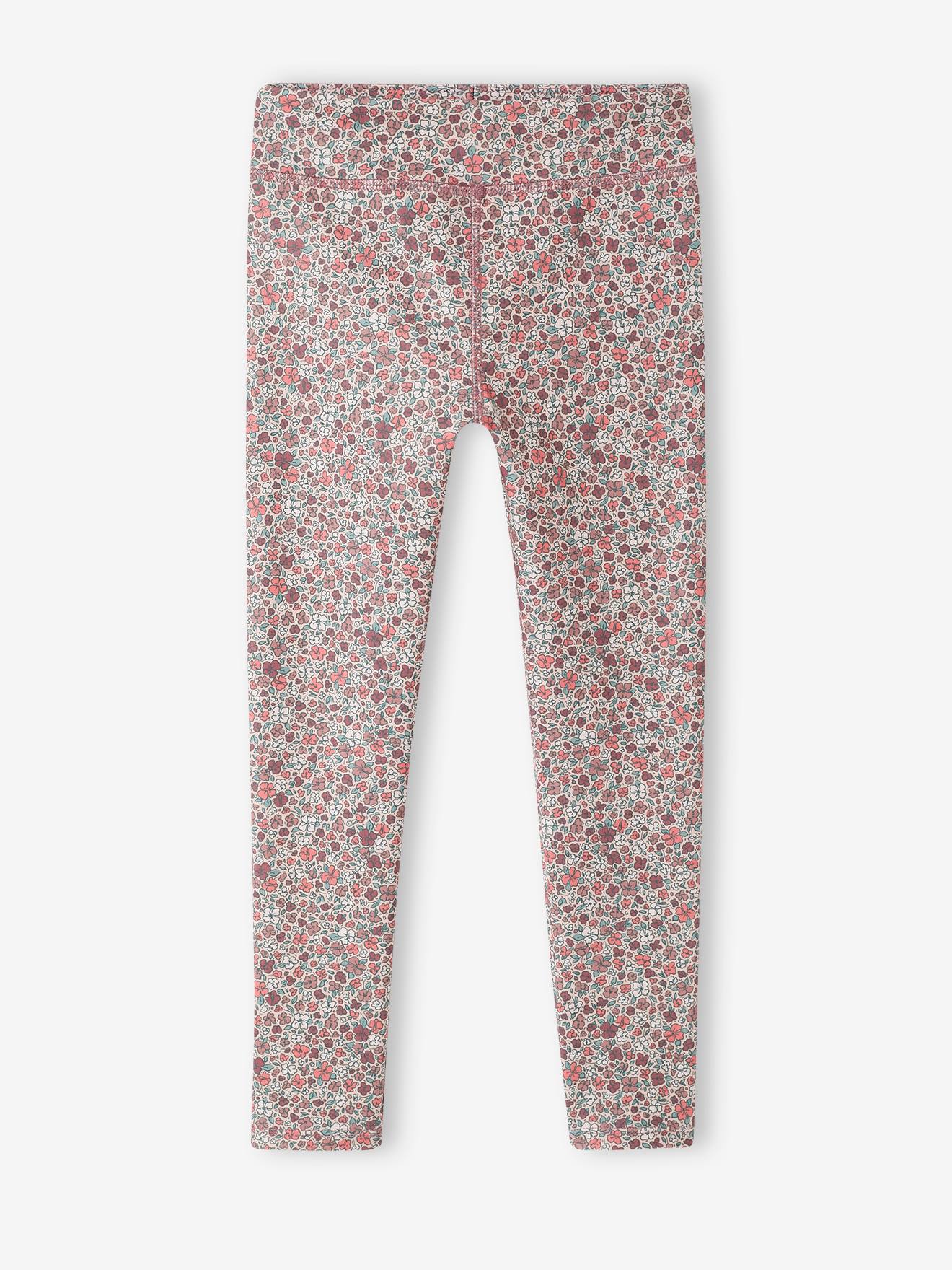 Leggings esportivas femininas em tecido técnico com estampa floral rosa.