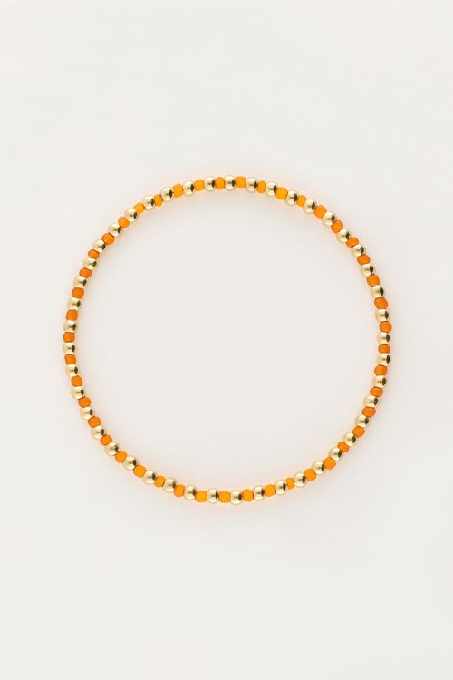Ocean elastieken armband en kraaltjes oranje