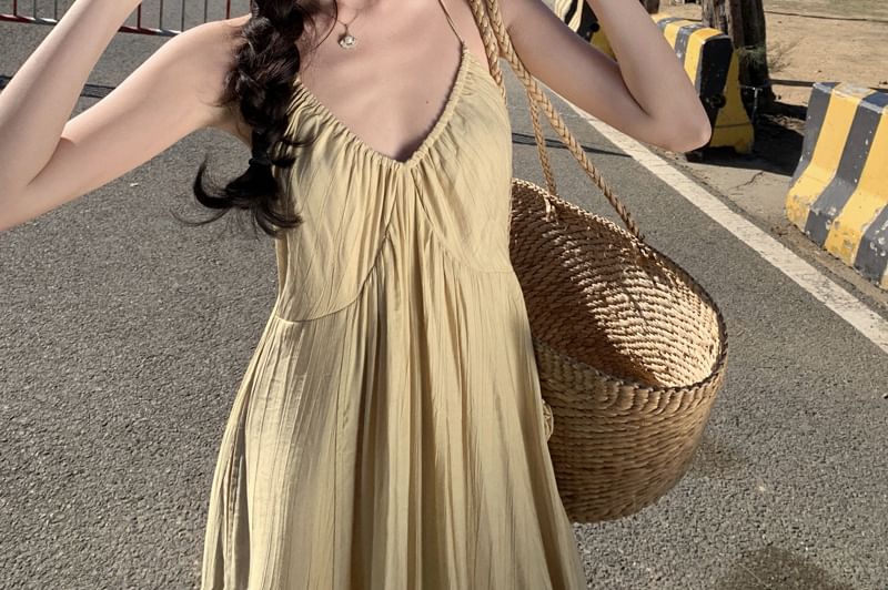 Egsy - Halter jumpsuit met wijde pijpen en effen bloemendetail