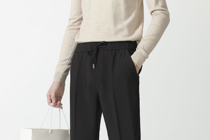 Loansk - Effen cropped, taps toelopende broek met trekkoord in de taille