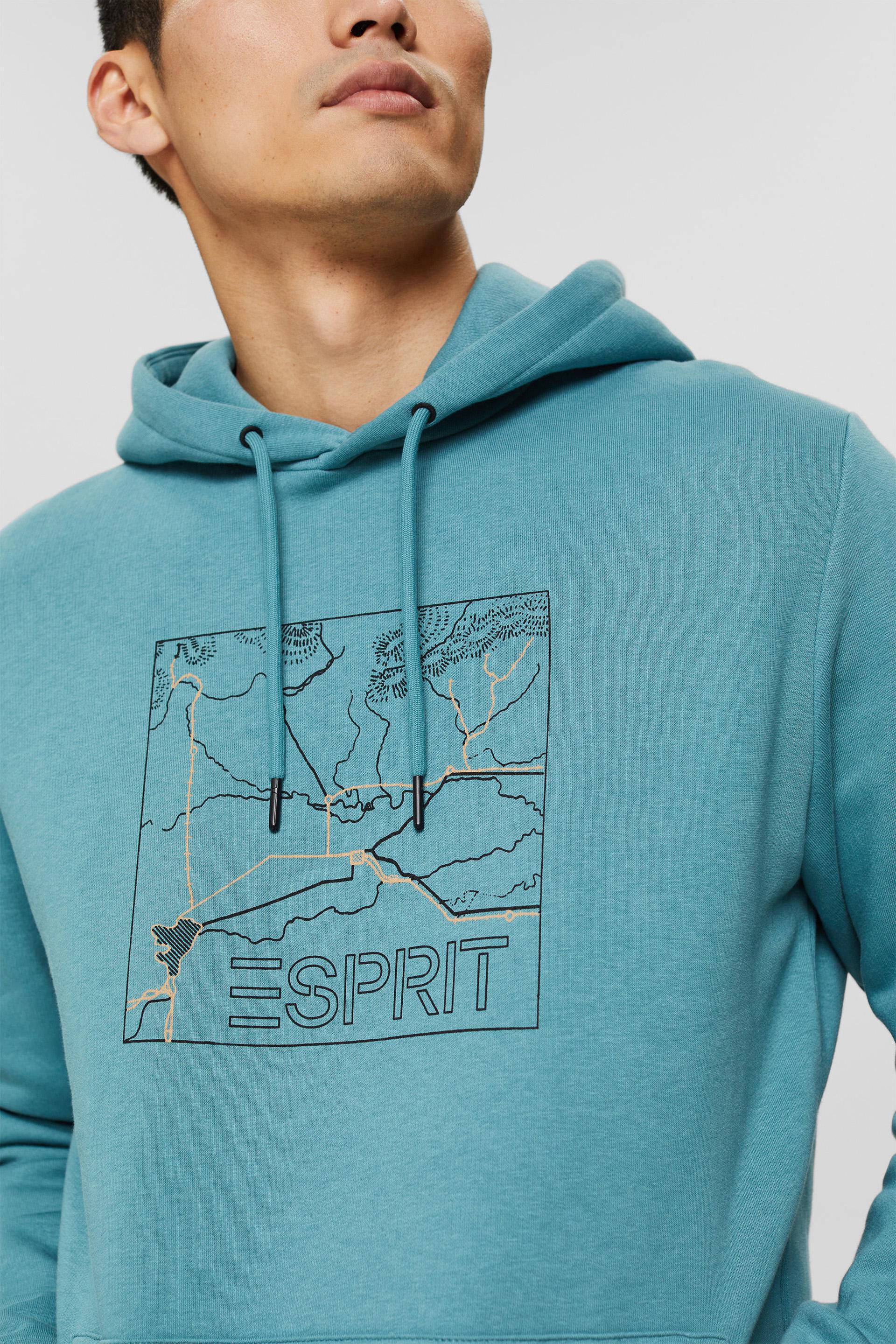 En matière recyclée le sweat à capuche orné d´un imprimé