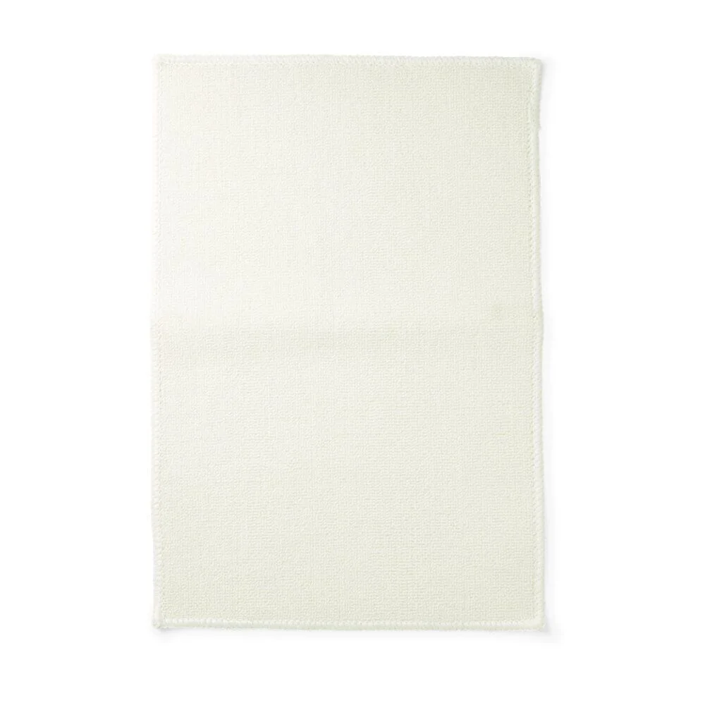 Tapis salle de bain 57x38cm polypropylène et latex blanc