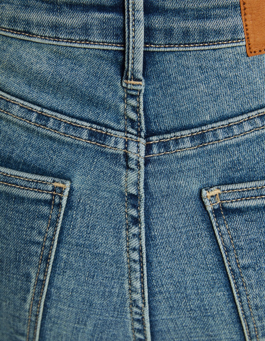 calça jeans skinny de cintura super alta