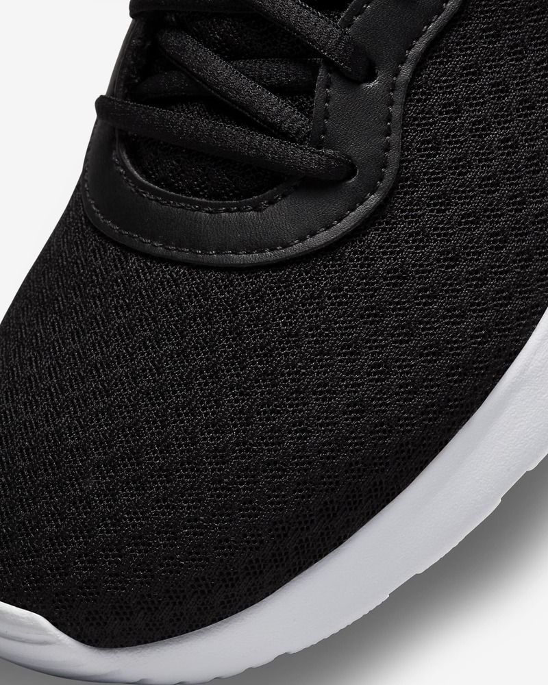 Chaussures Nike Tanjun Noir & Blanc pour femme