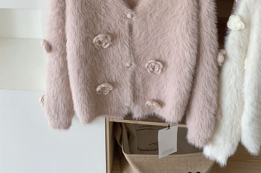 Dute - V-hals vest met bloemendetail en knopen
