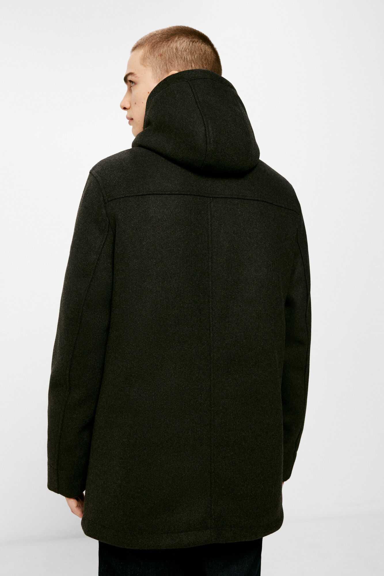 Parka com efeito lã e capuz.