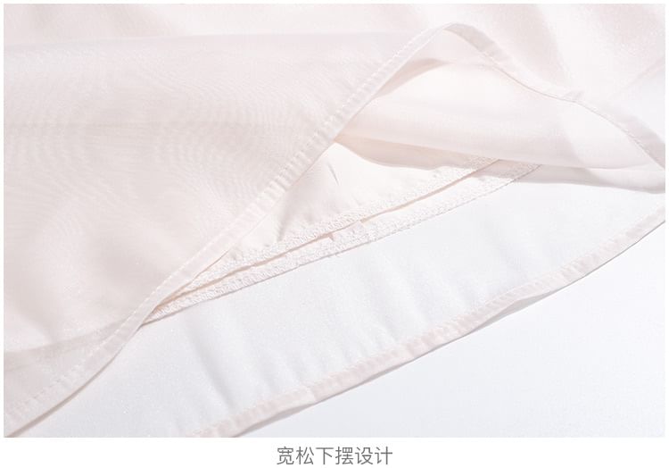 Daybreak - Blouse met pofmouwen en hoge hals, effen en ruches