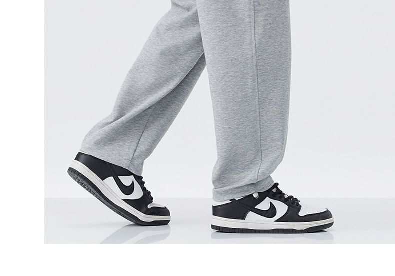 Nataro - Effen joggingbroek met trekkoord in de taille en wijde pijpen