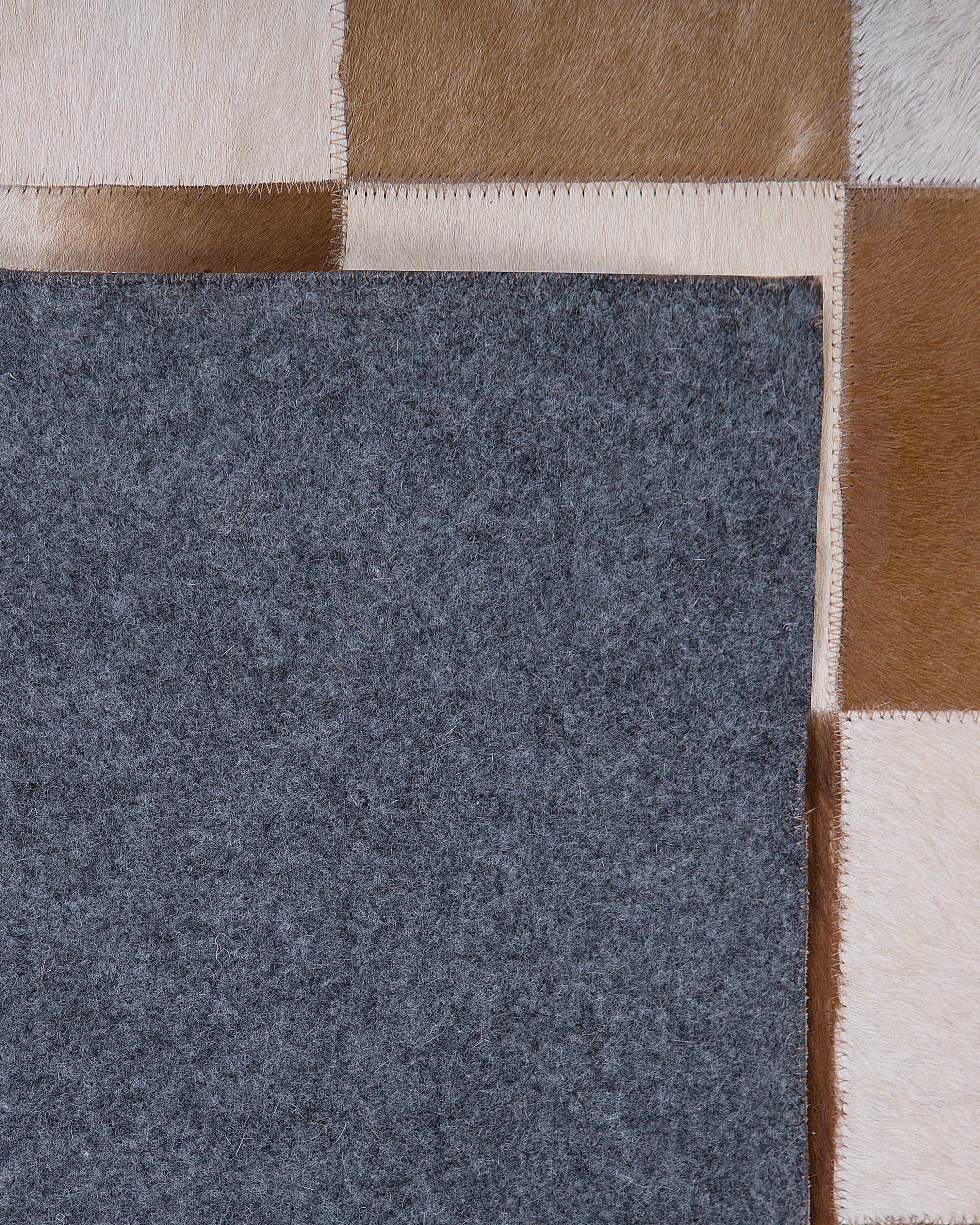 Vloerkleed SOLMAZ Beige 140 x 200 cm Leer