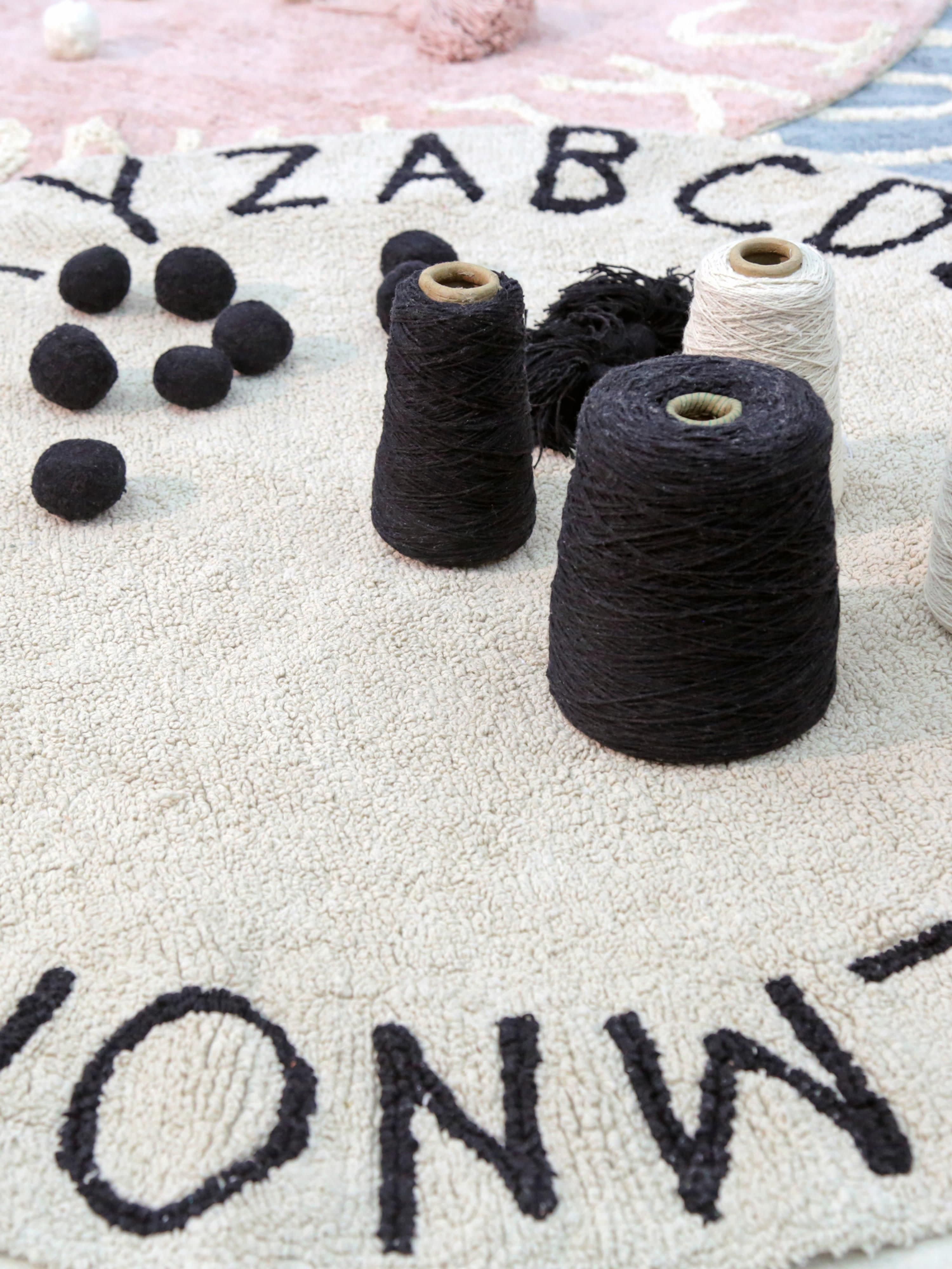 Rond kindervloerkleed ABC met lettermotief
