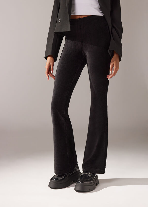 Calças legging flare de veludo cotelê