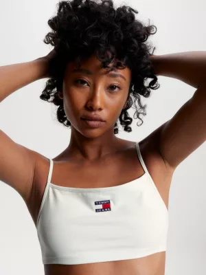 Top cropped ultra com amarração nas costas e distintivo