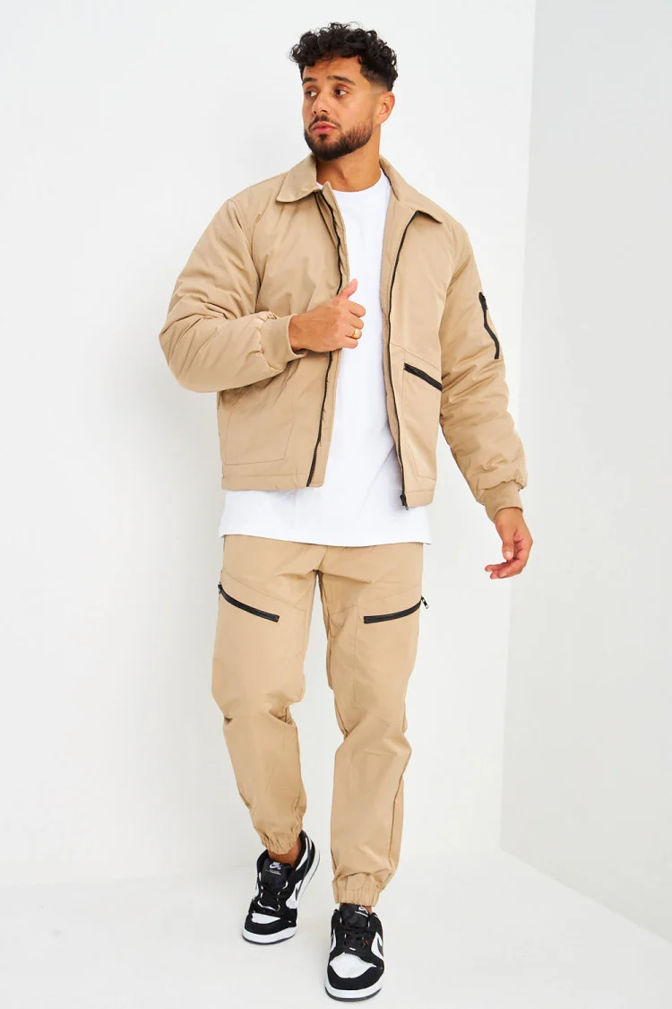 Pantalon de jogging beige foncé zippé