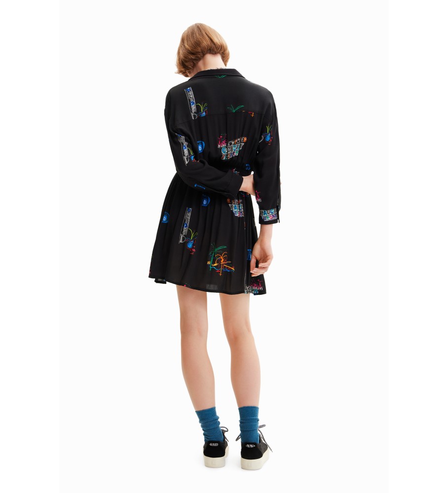 Vestido curto estilo camisa da Desigual com ilustrações pretas.