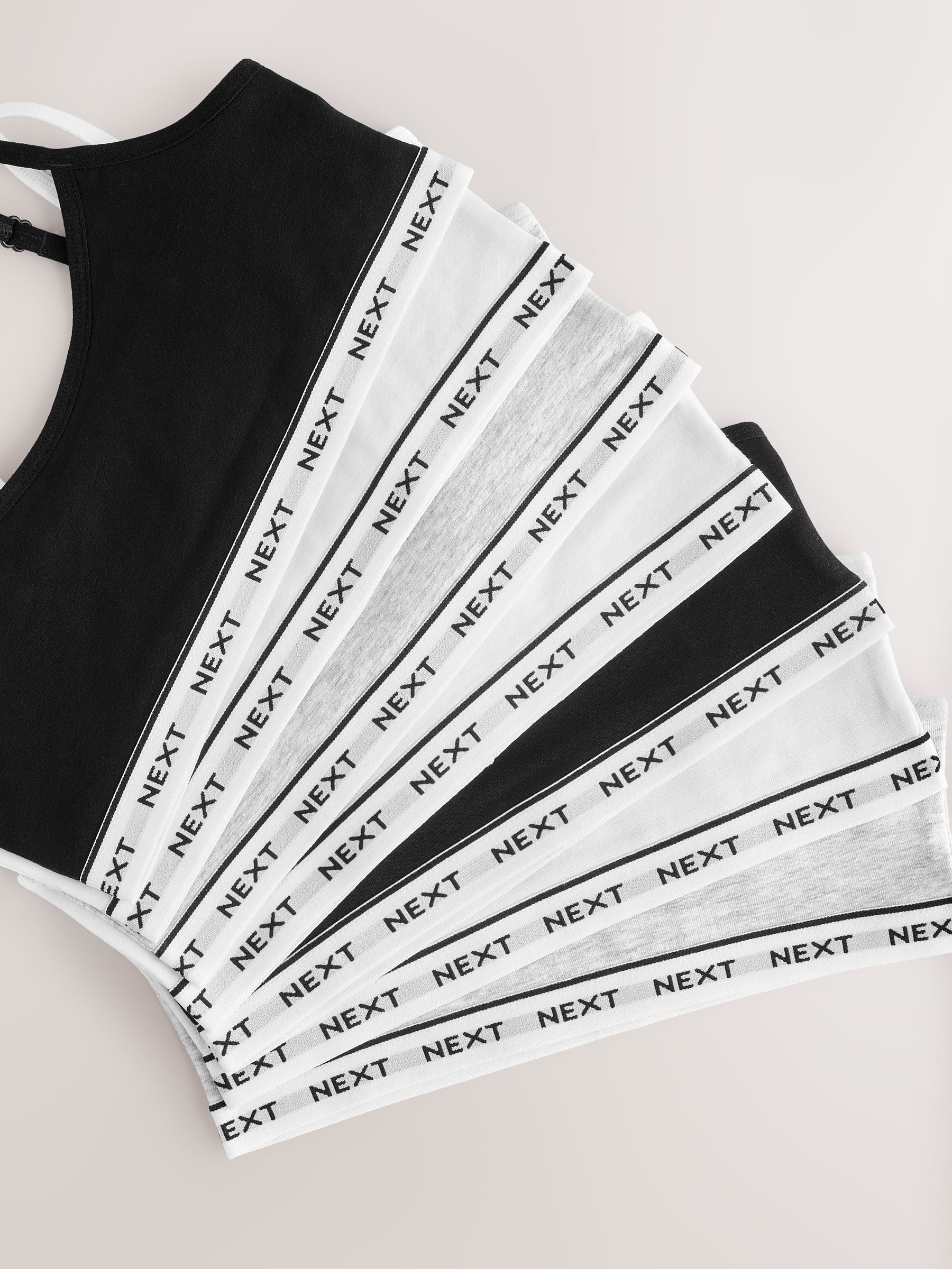Zwart/wit/grijs - Set van 7 crop tops met bandjes (5 - 16 jr)