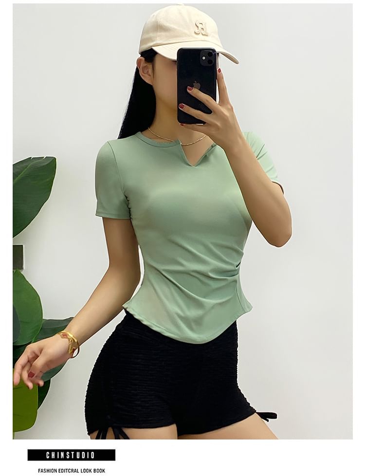 Engiko - Sport-T-shirt met korte mouwen en inkeping in de hals, effen en asymmetrisch