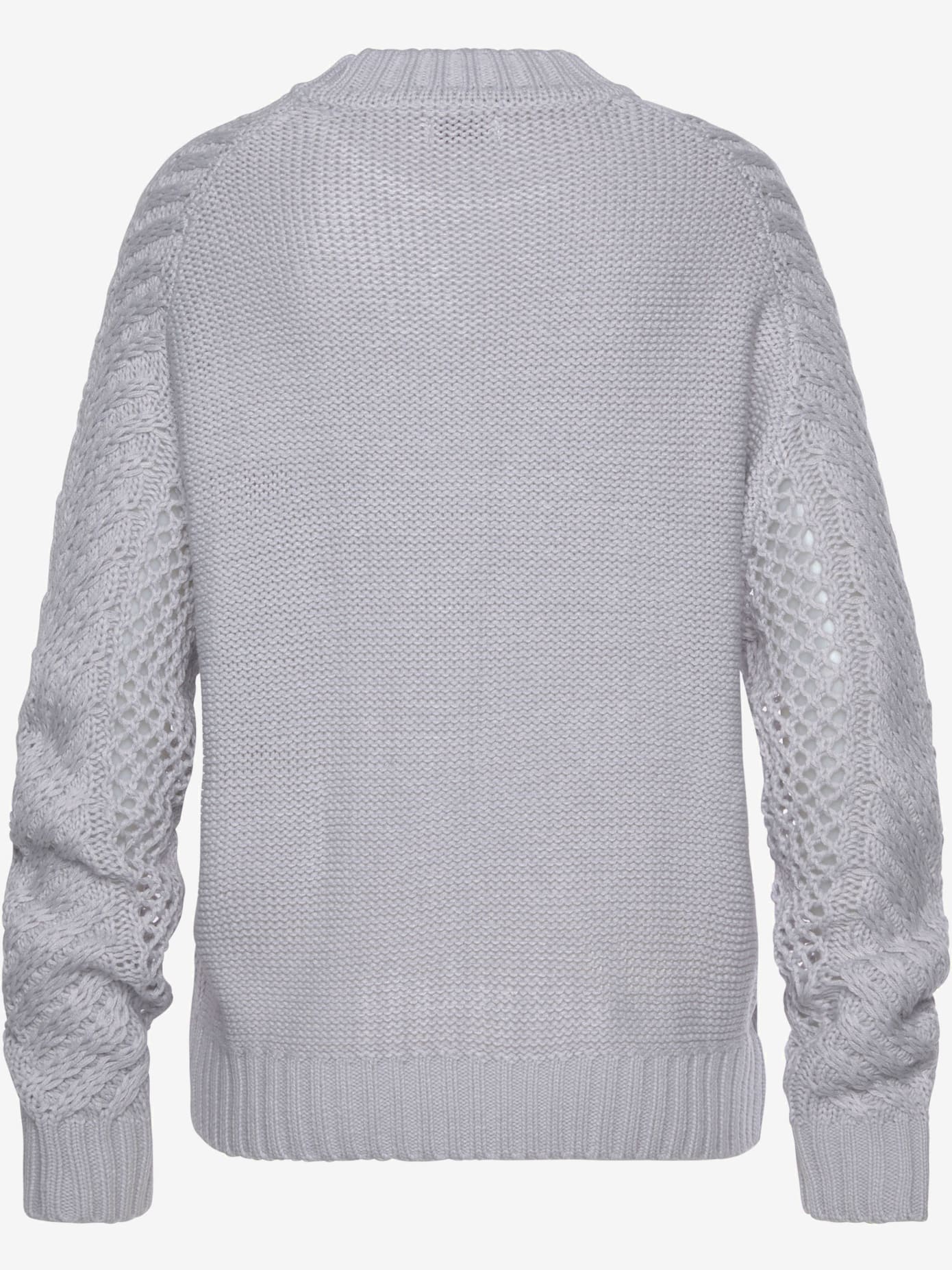 Pull ajouré superbe motif ajouré devant