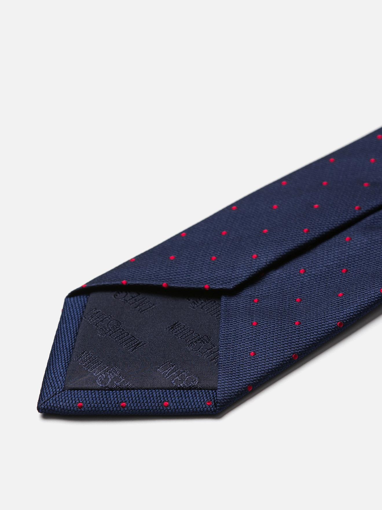 Cravate en soie à pois rouge