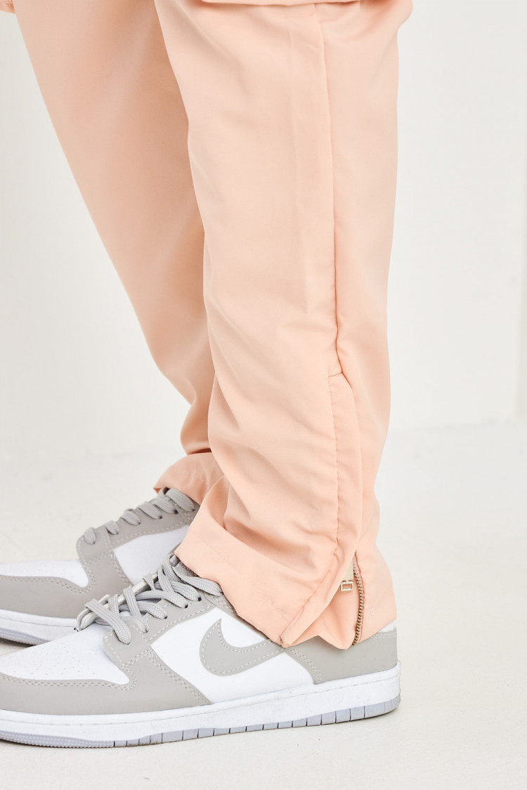 Pantalon de jogging rose poches cargo et zippé aux chevilles