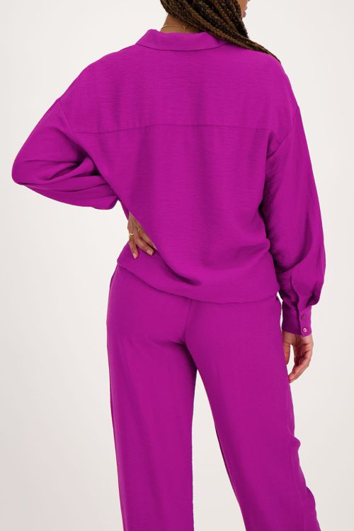 Paarse blouse met knopen