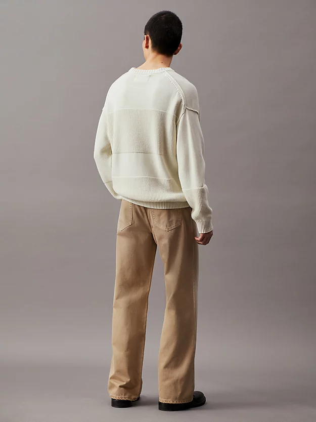 Calça jeans plissada de perna larga