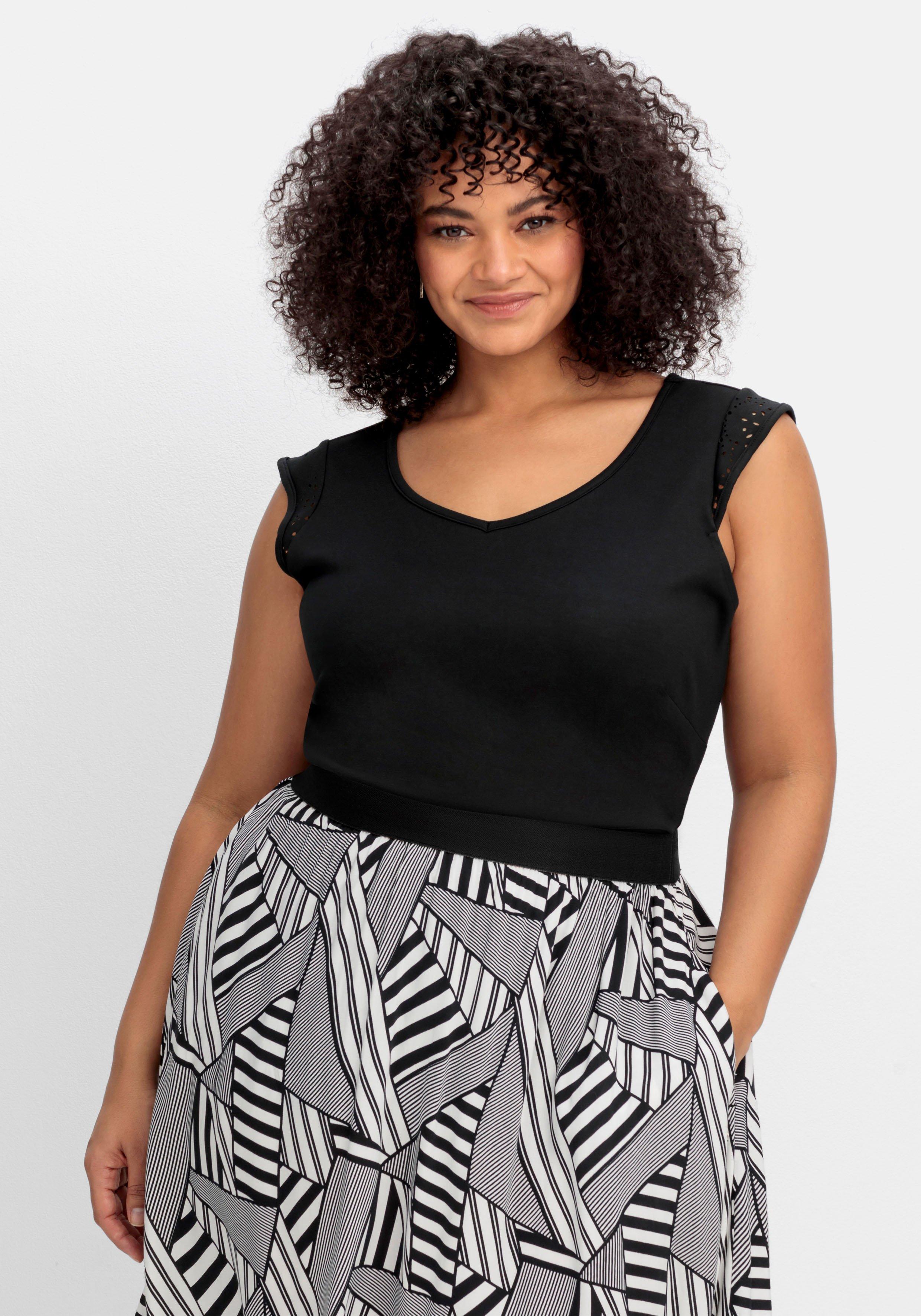 Top mit Lasercut-Muster am Ärmel