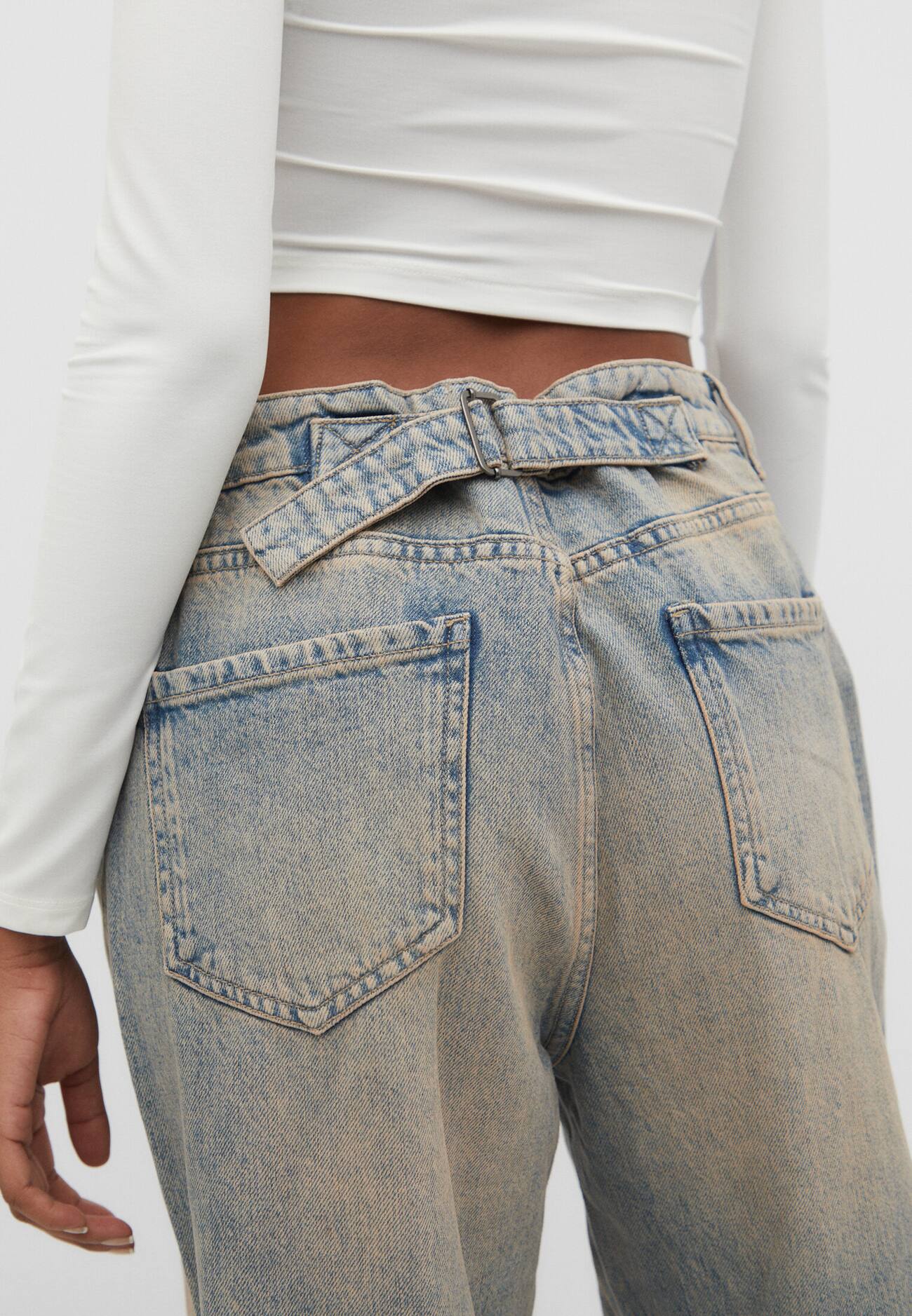 calças jeans largas ajustáveis