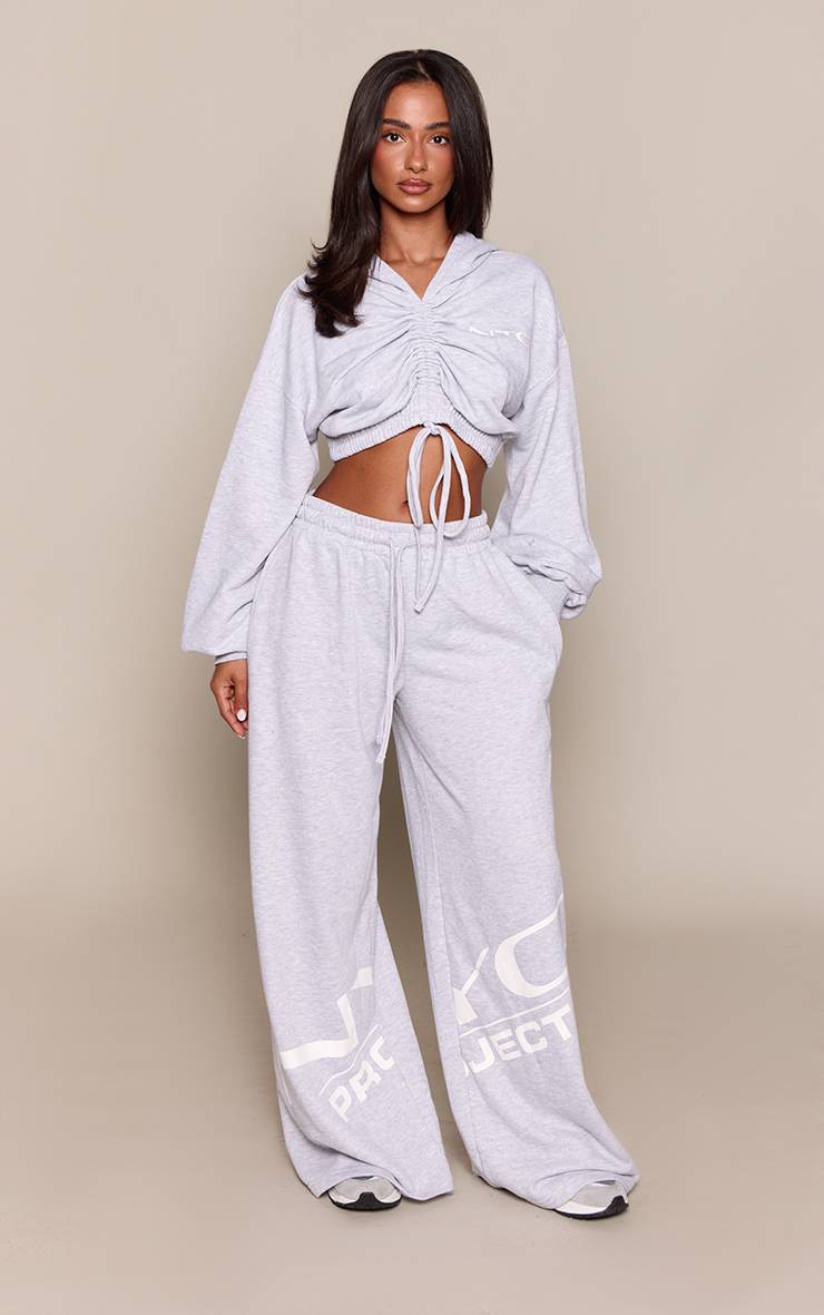 Gris Cendré Jogging Petite Taille Basse À Jambes Larges Avec Détails Graphiques