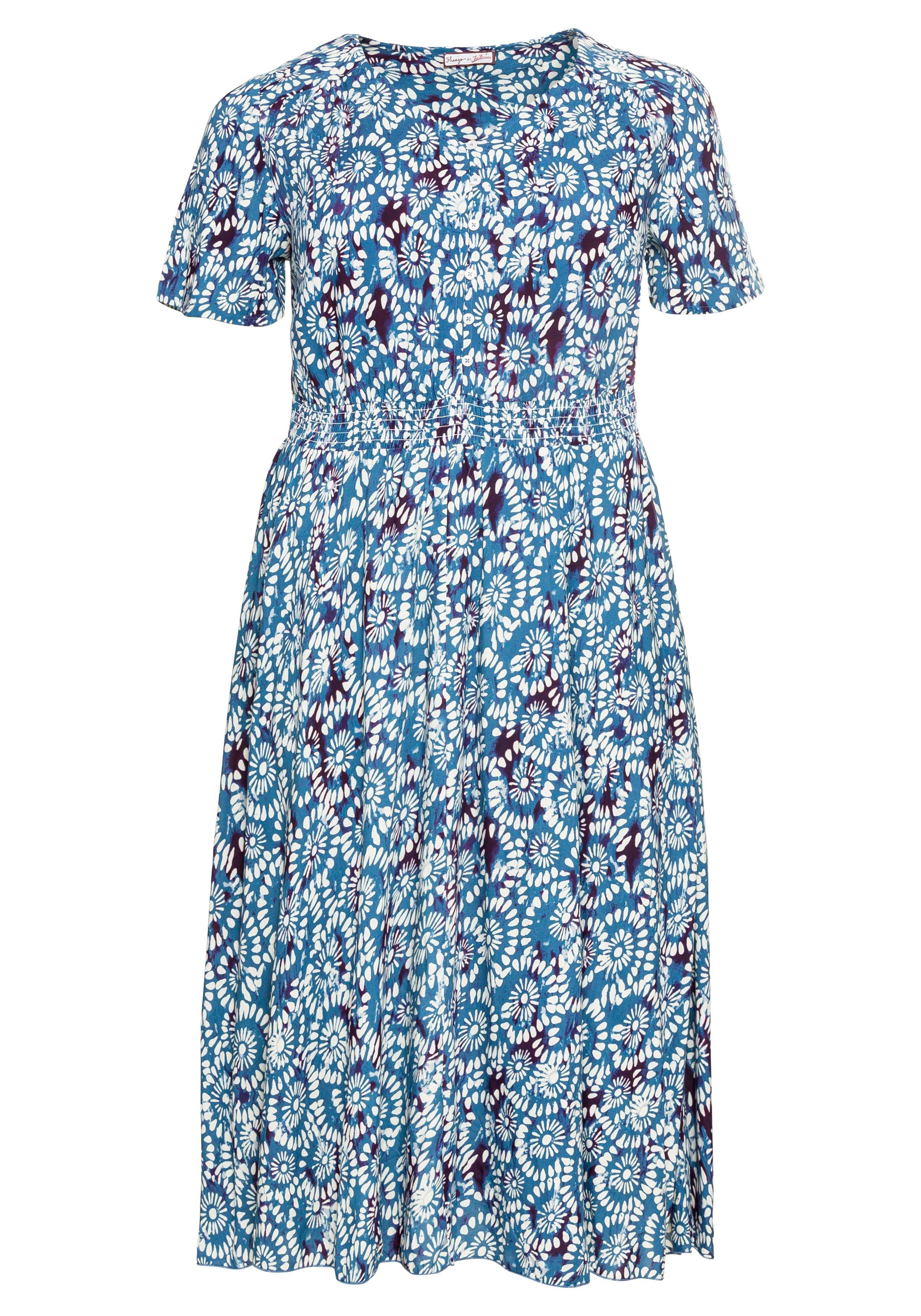 Kleid mit Alloverdruck und Smokbund