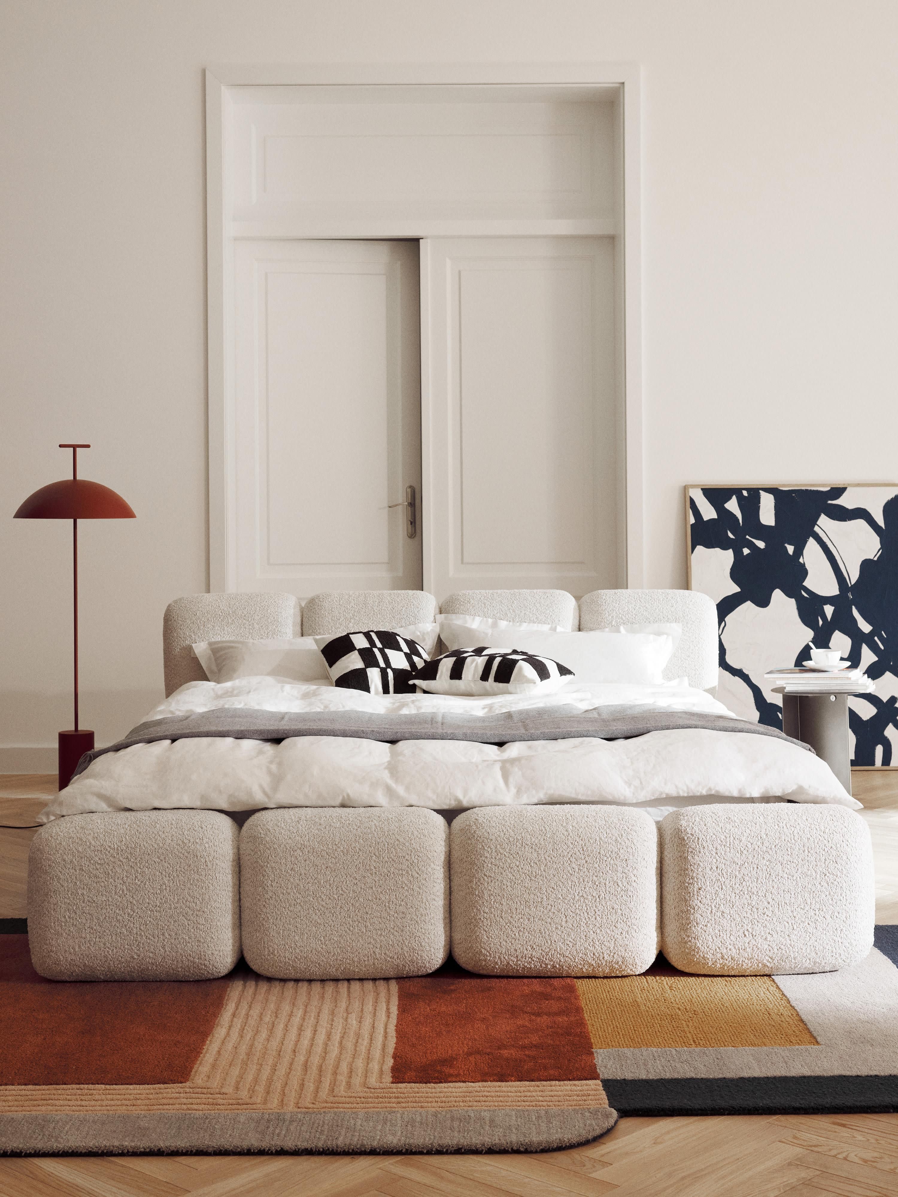 Gestoffeerd bed Tayla van teddy bouclé met opbergruimte