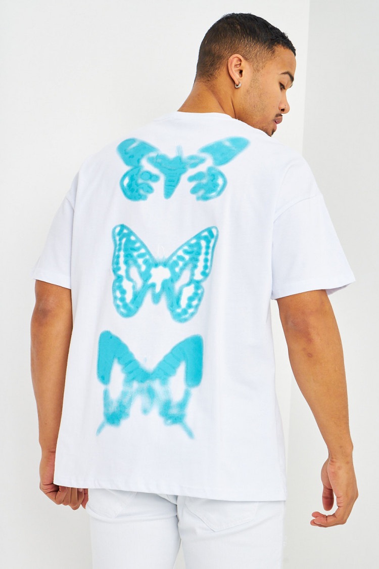 T-shirt blanc oversize papillons bleus