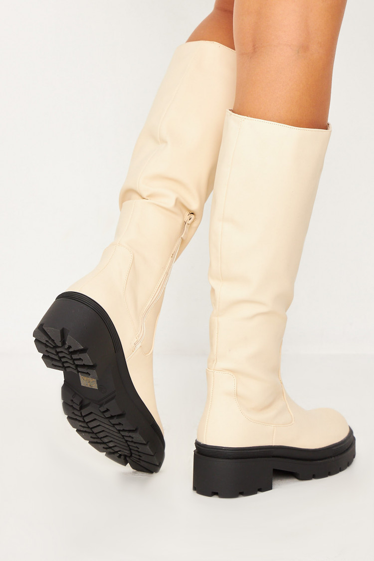 Bottes beiges à semelle noire